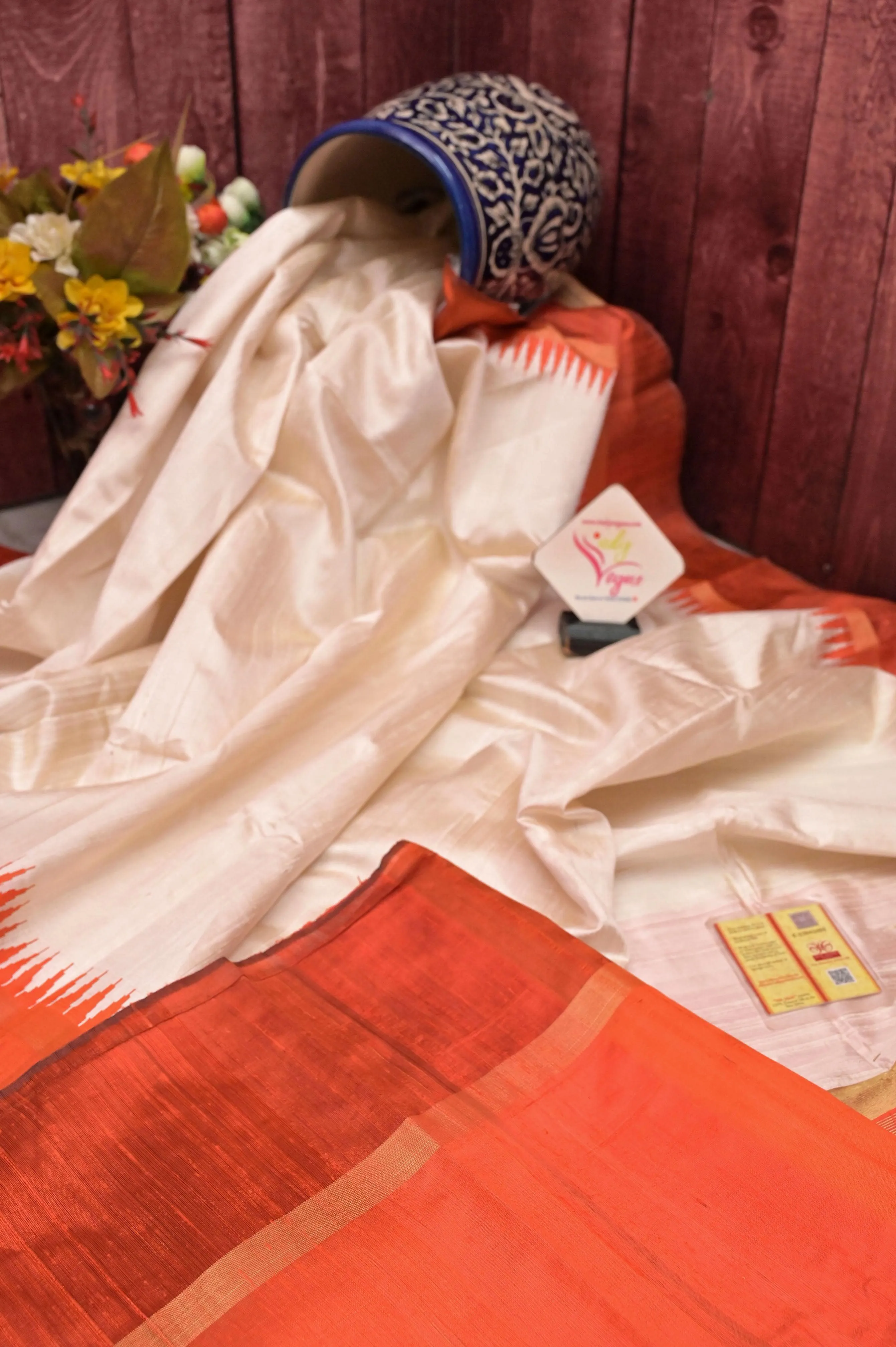 Offwhite and Orange Color Raw Silk Saree with Temple Border