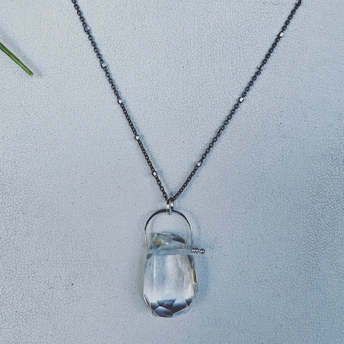 Oxi stirrup quartz crystal necklace