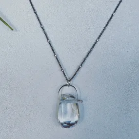 Oxi stirrup quartz crystal necklace