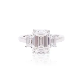 PLATINUM EMERALD-CUT THREE-STONE ENGAGEMENT RING WITH A 4.01CT EMERALD-CUT DIAMOND CENTER