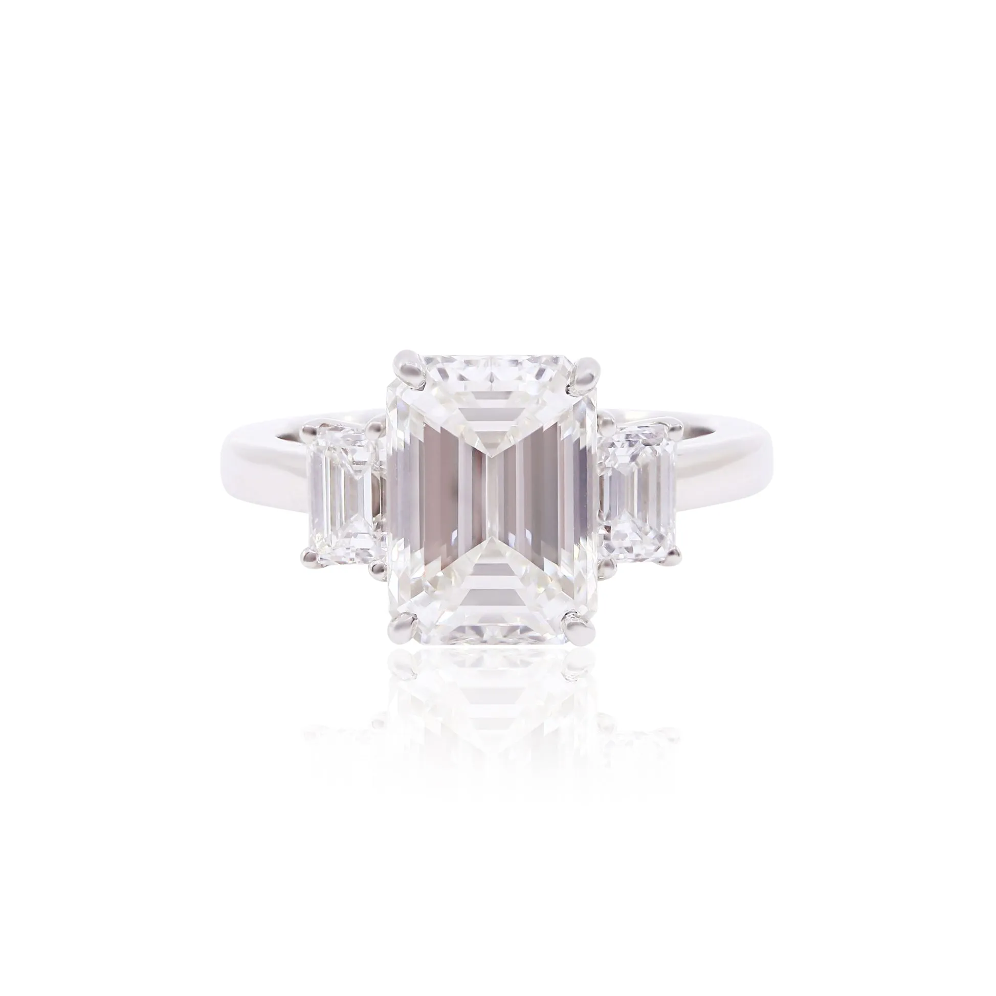 PLATINUM EMERALD-CUT THREE-STONE ENGAGEMENT RING WITH A 4.01CT EMERALD-CUT DIAMOND CENTER