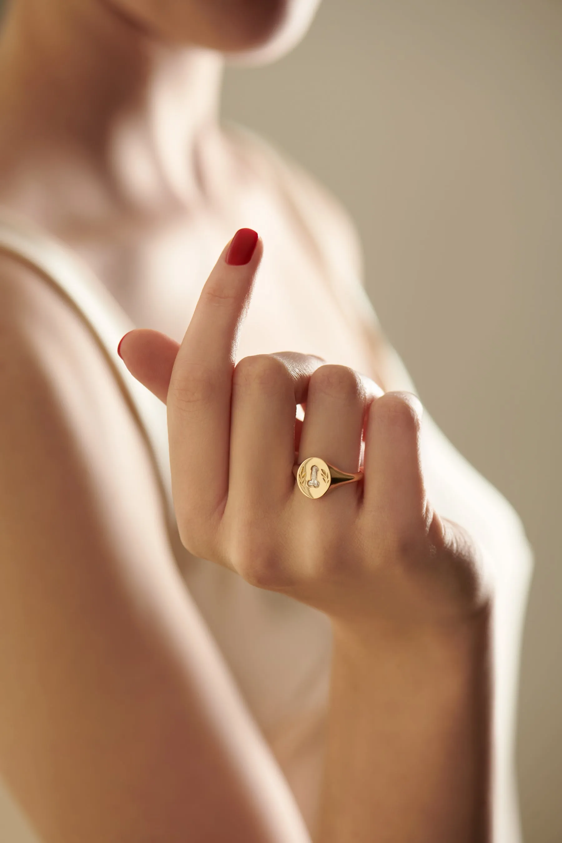 Statement Signet Ring with a F.U. Diamond and Hand Engraving